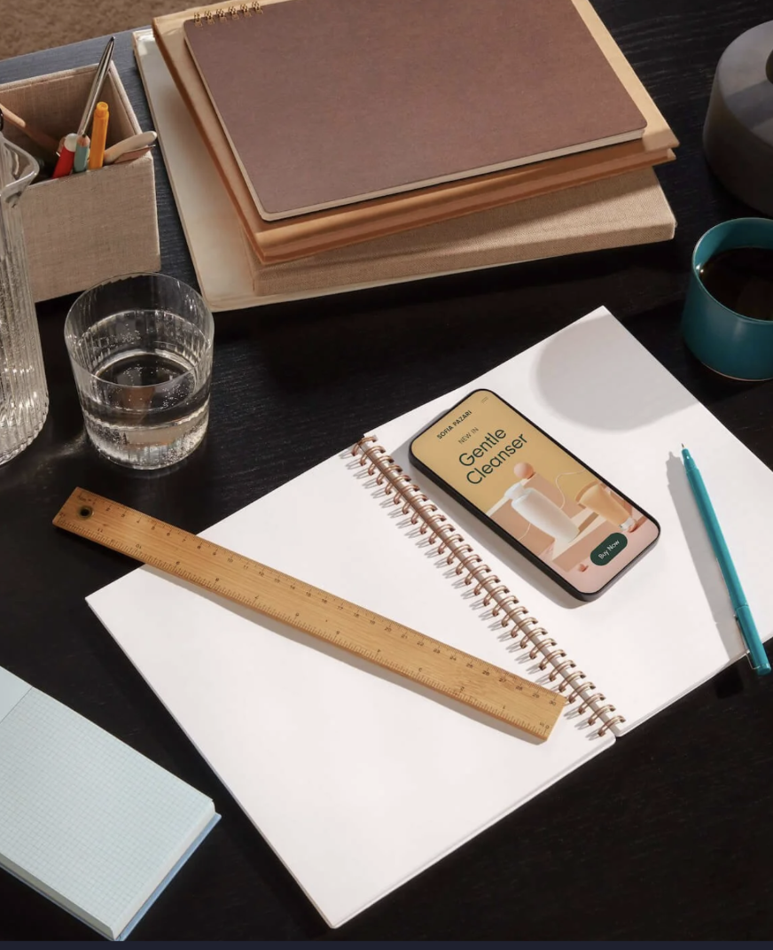 Desk setup with notebooks and workspace
